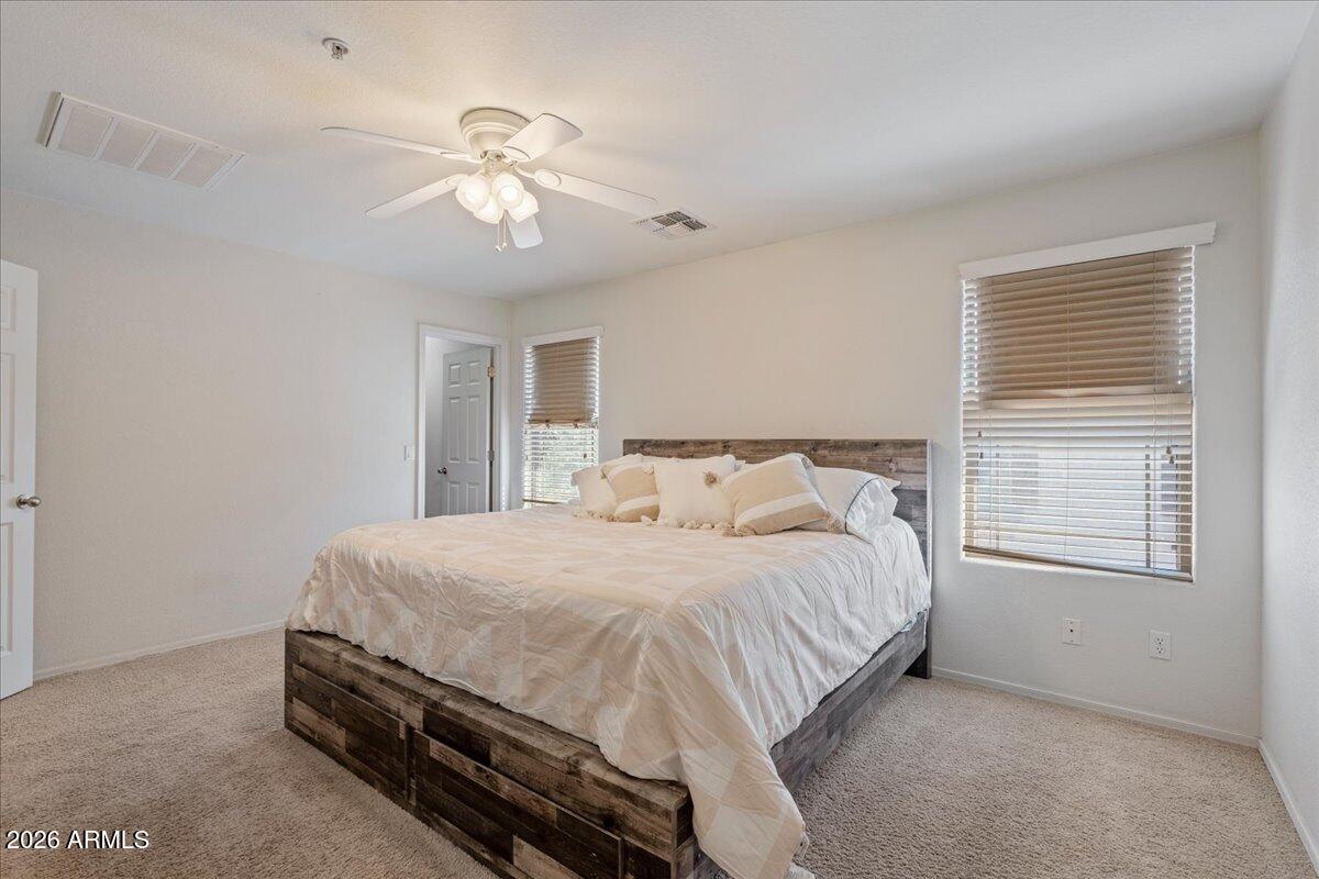 1255 South Rialto, Unit 106 Mesa, AZ 85209 - Photo 14 of 32 a bedroom with a bed and window
