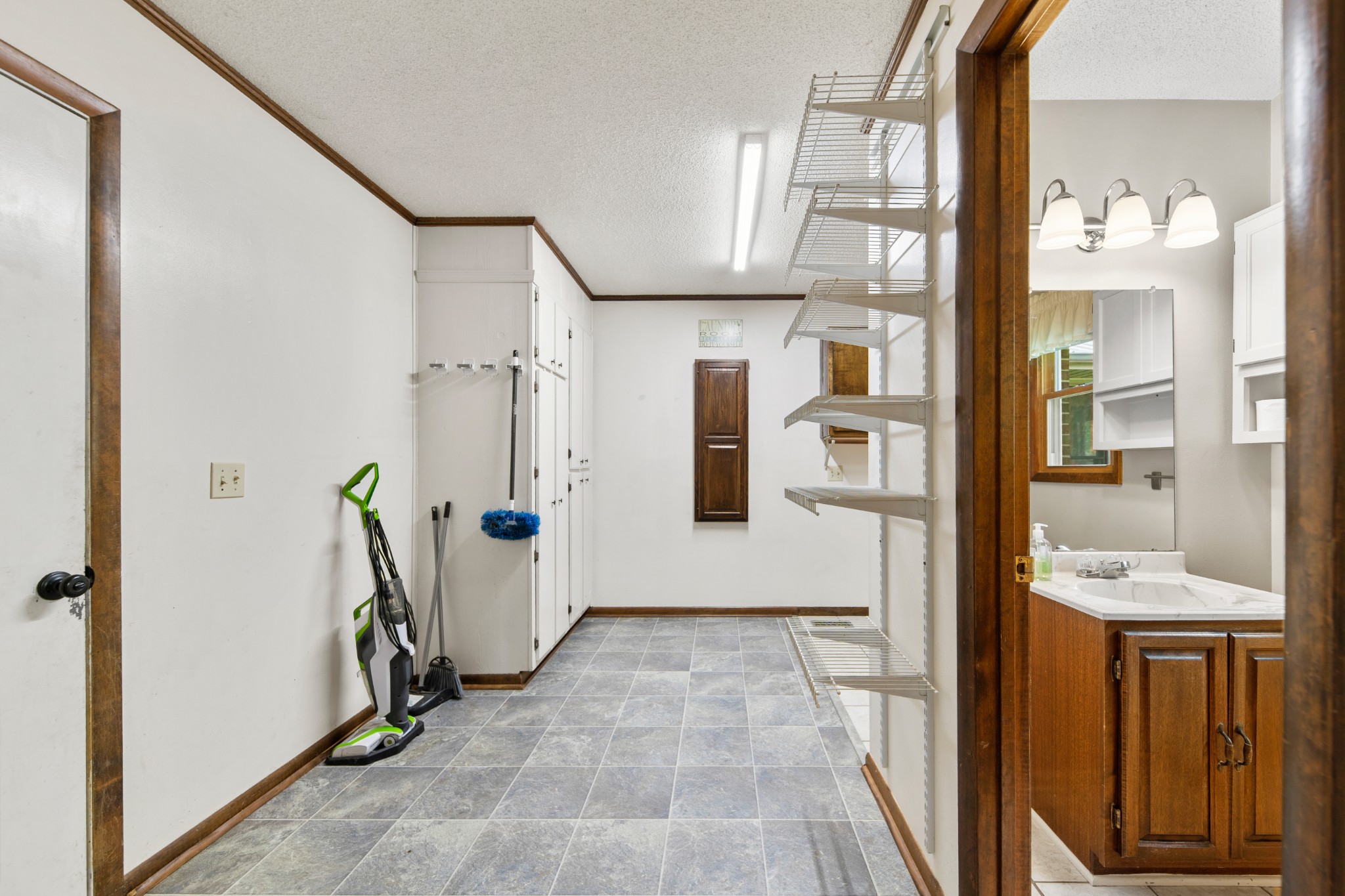 239 Henry Bayless Road Ardmore, TN 38449 - Photo 13 of 82 a view of a hallway with wooden floor and staircase