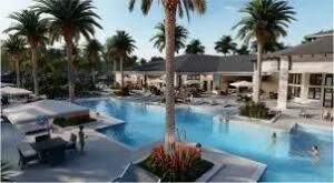 an aerial view of a residential houses with outdoor space