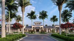 9093 Chauvet Way Boca Raton, FL 33496 - Photo 31 of 31 a front view of multi story residential apartment building with a yard and entertaining space