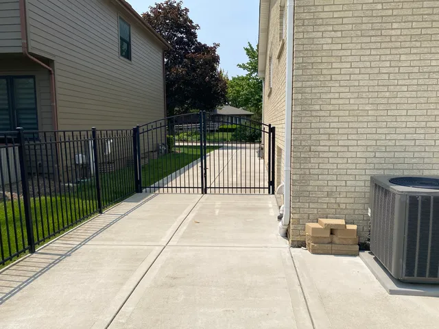 a backyard of a house with lots of green space