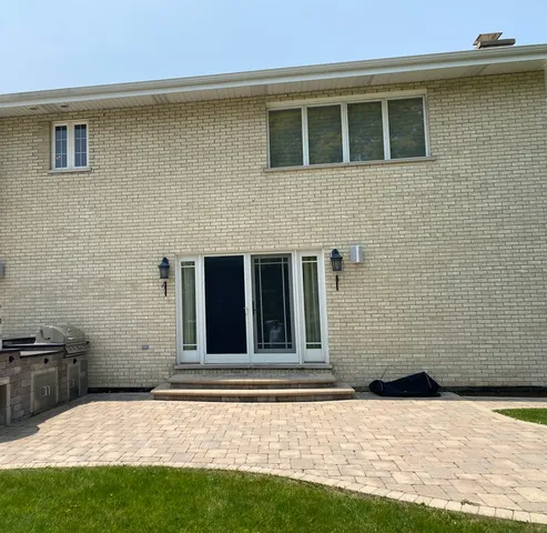 a view of garage and yard