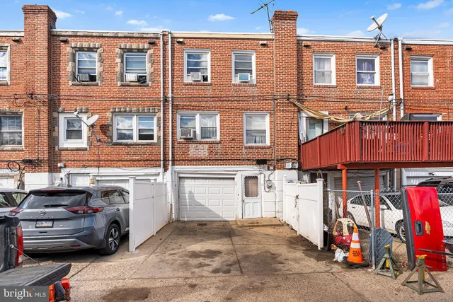 a view of a car park in front of building