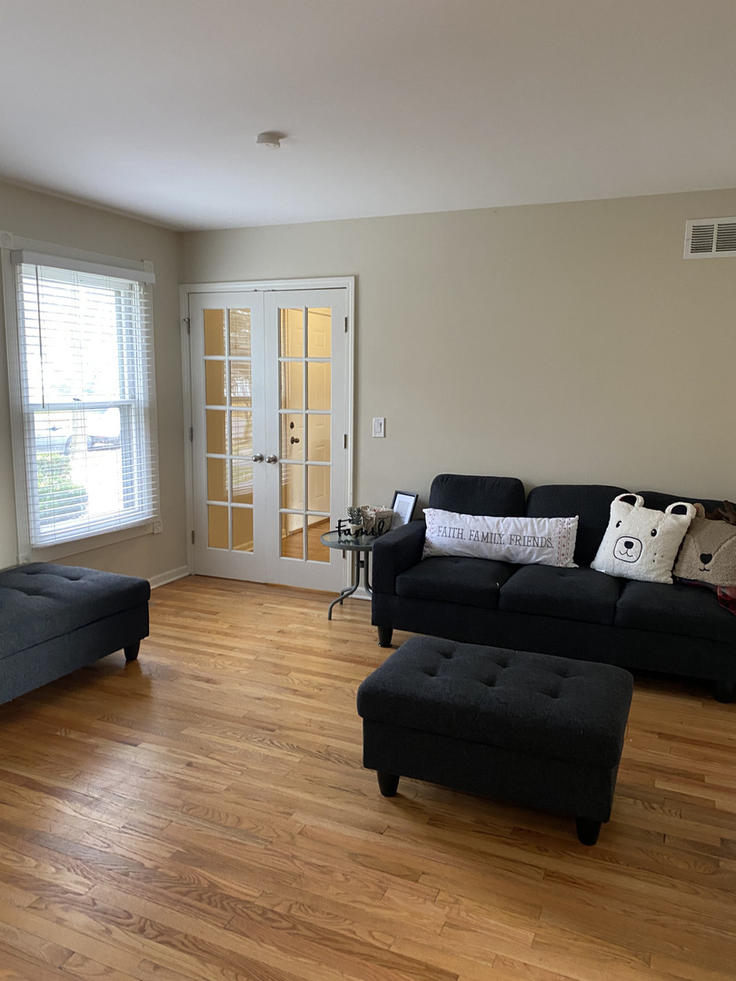 1805 Rita Avenue St. Charles, IL 60174 - Photo 12 of 17 a living room with furniture window and wooden floor
