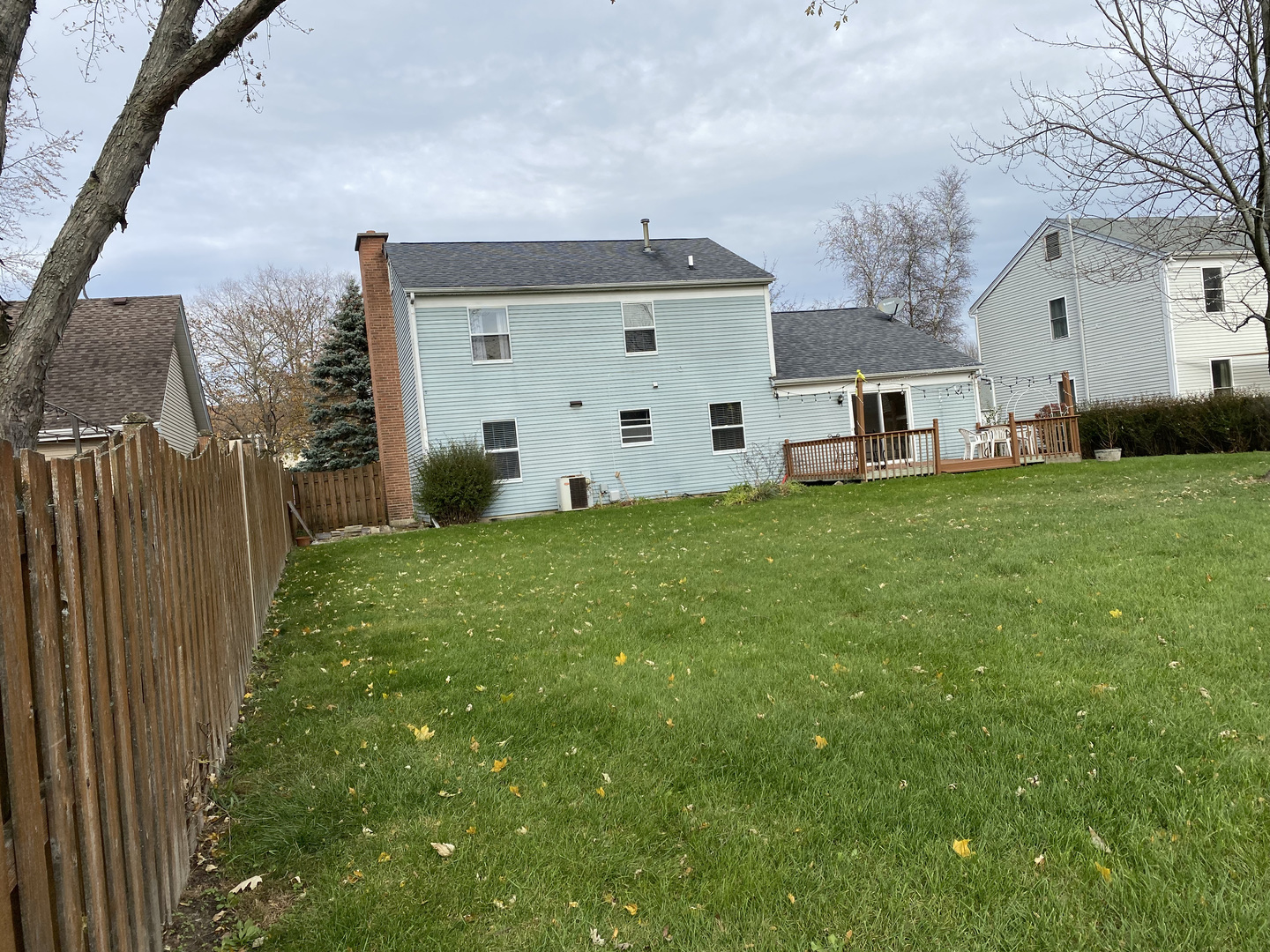 1805 Rita Avenue St. Charles, IL 60174 - Photo 6 of 17 a front view of a house with garden