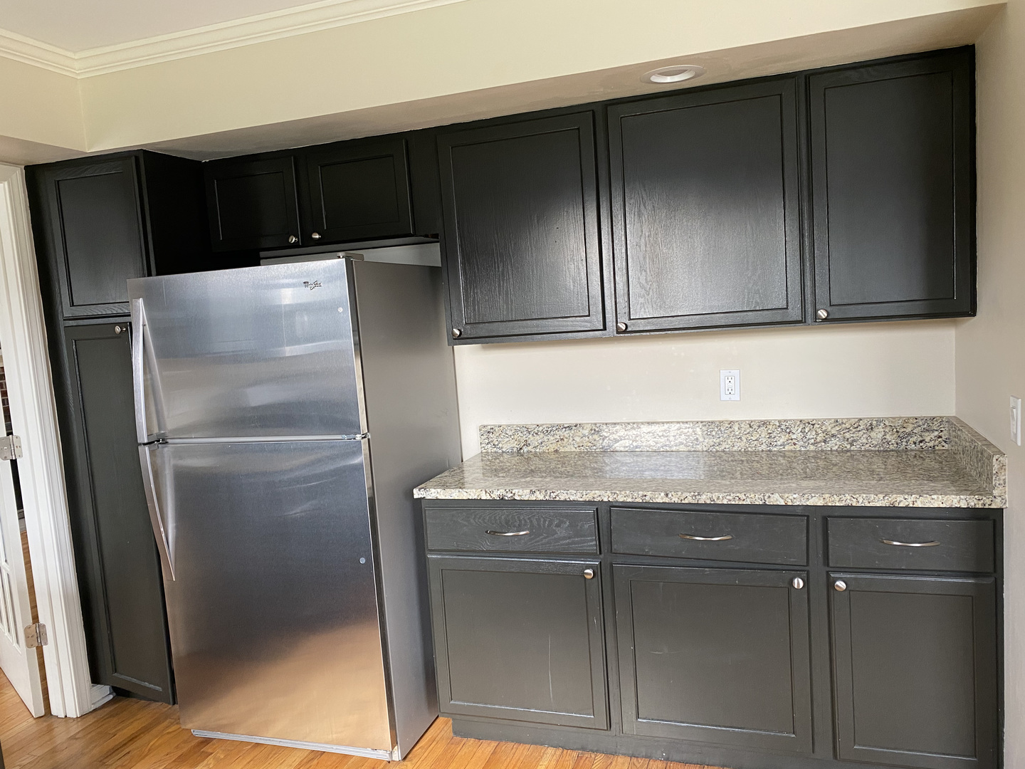 1805 Rita Avenue St. Charles, IL 60174 - Photo 9 of 17 a kitchen with granite countertop cabinets and refrigerator