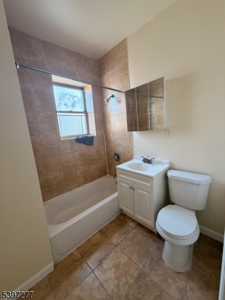 120 Bragaw Avenue, Unit 3 Newark, NJ 07112 - Photo 12 of 16 a bathroom with a toilet sink and bathtub