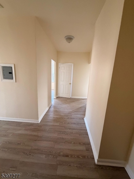 120 Bragaw Avenue, Unit 3 Newark, NJ 07112 - Photo 15 of 16 a view of entryway with wooden floor
