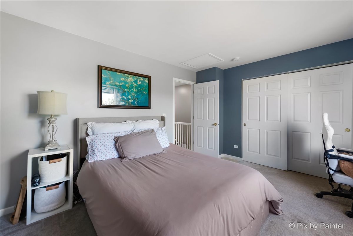 5742 Fieldstone Trail McHenry, IL 60050 - Photo 19 of 29 a bedroom with a bed and a tv