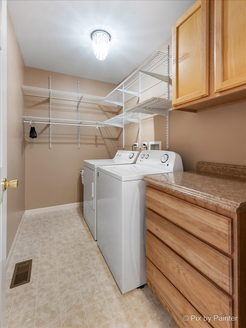 5742 Fieldstone Trail McHenry, IL 60050 - Photo 22 of 29 a utility room with dryer and washer