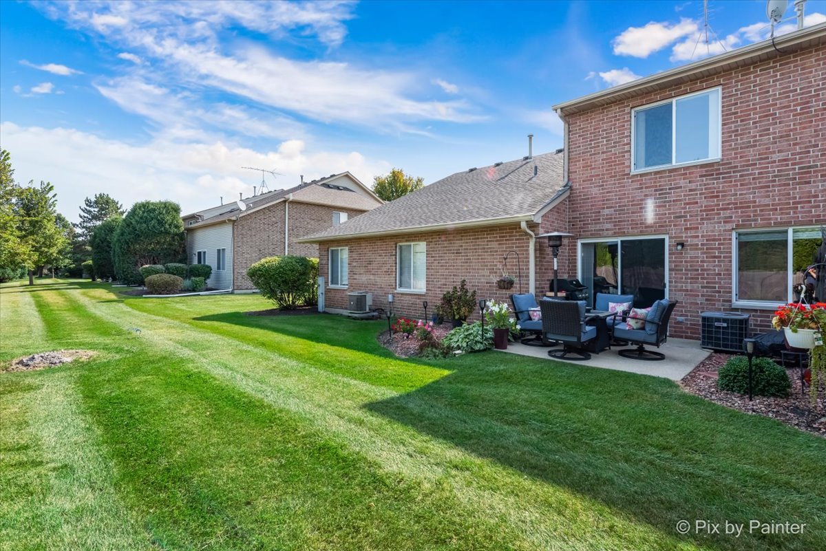 5742 Fieldstone Trail McHenry, IL 60050 - Photo 26 of 29 a view of a house with a yard porch and sitting area