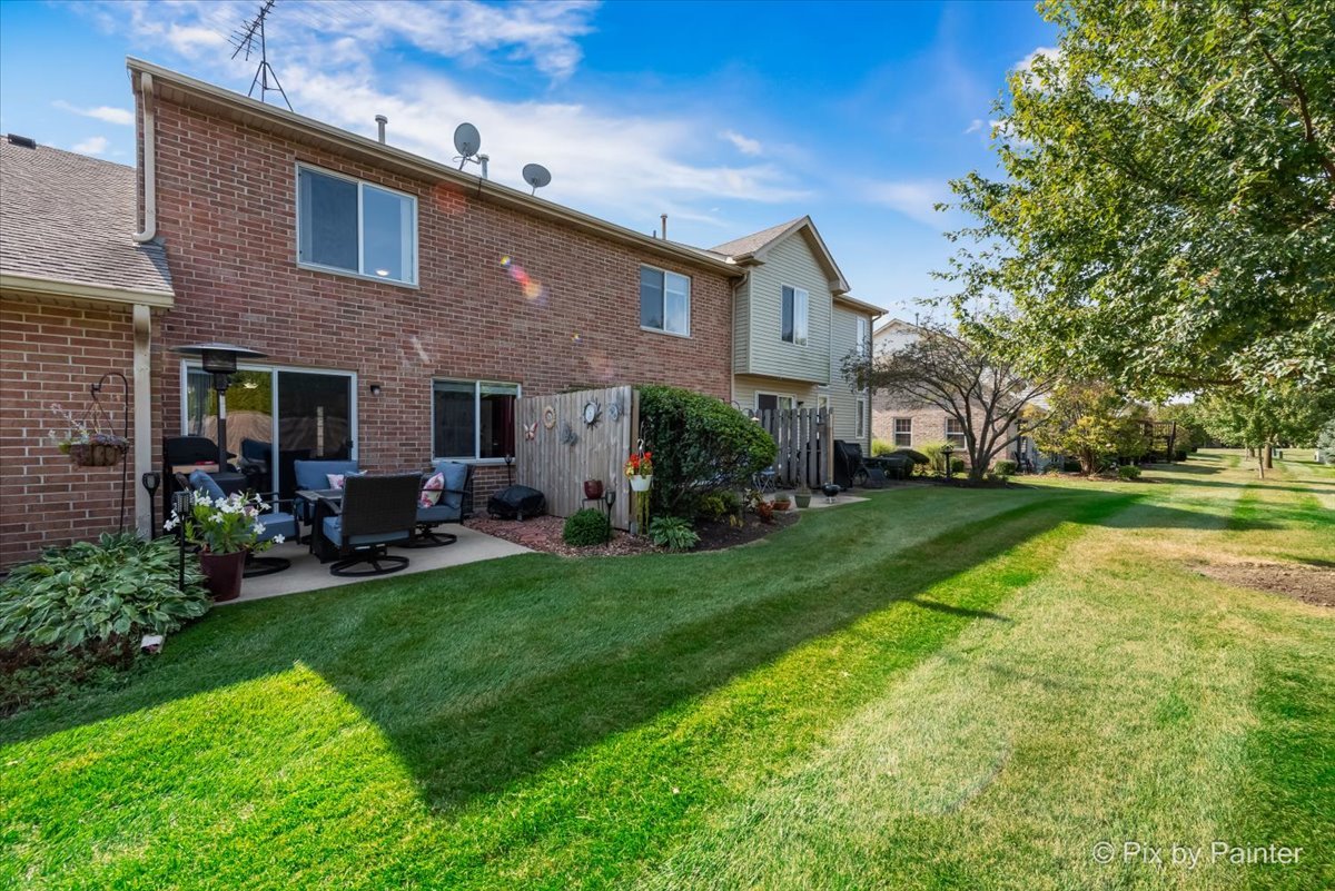 5742 Fieldstone Trail McHenry, IL 60050 - Photo 3 of 29 a view of a house with a yard porch and sitting area