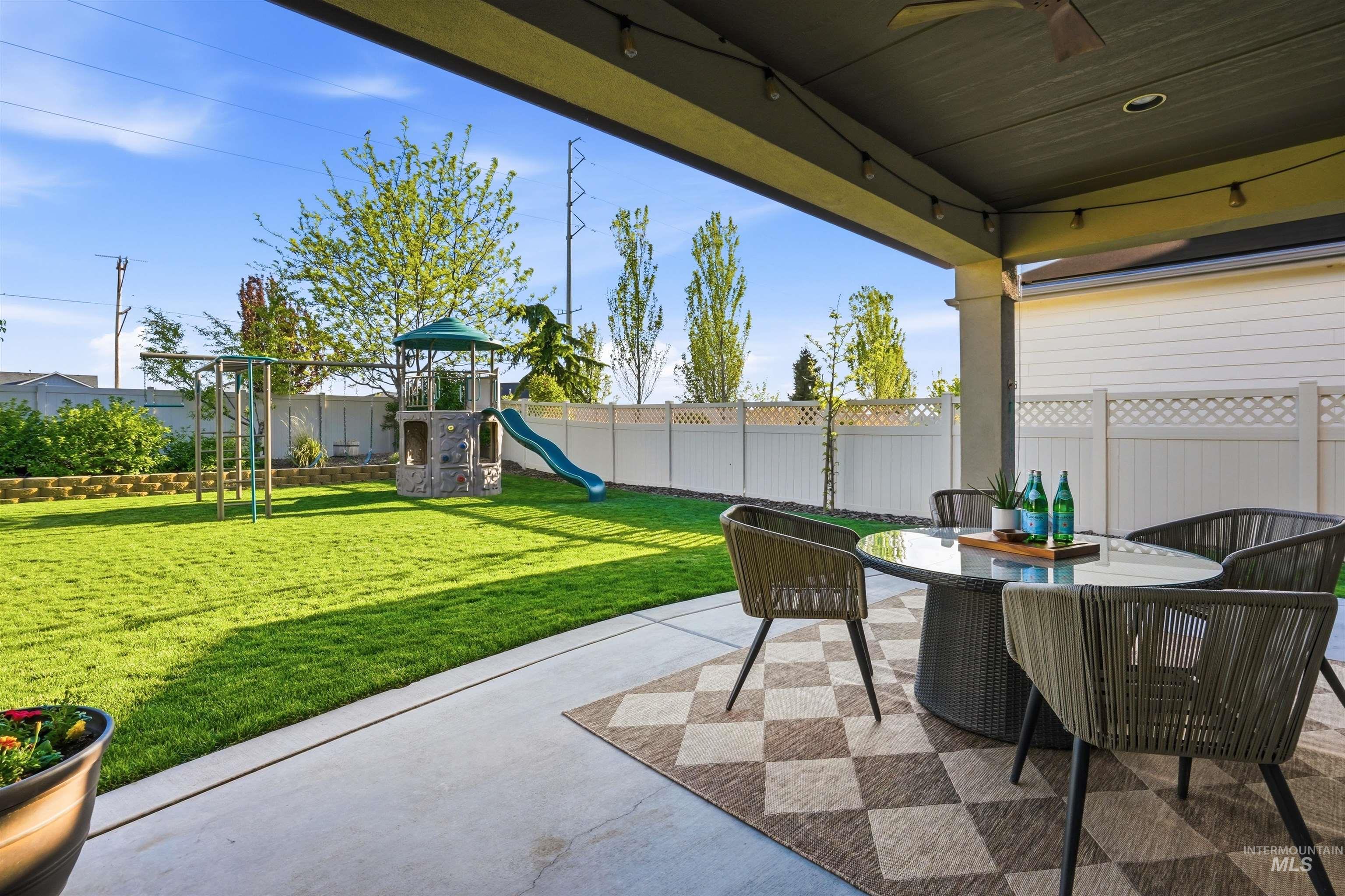3915 West Riva Capri Street Meridian, ID 83646 - Photo 37 of 49 Spacious concrete patio featuring a ceiling fan and recessed lighting