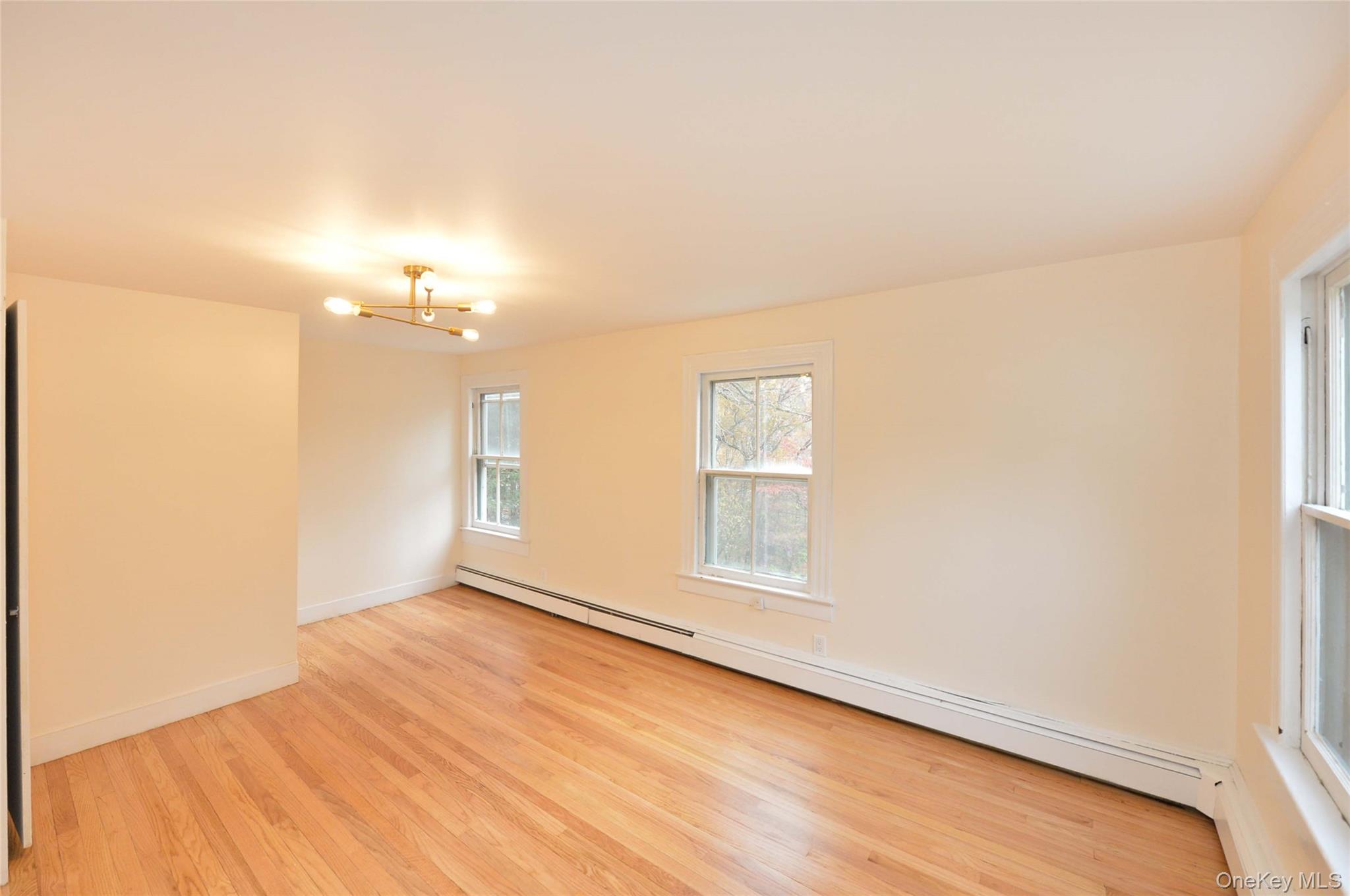 19 Johnsontown Road Sloatsburg, NY 10974 - Photo 30 of 41 a view of empty room with wooden floor and fan