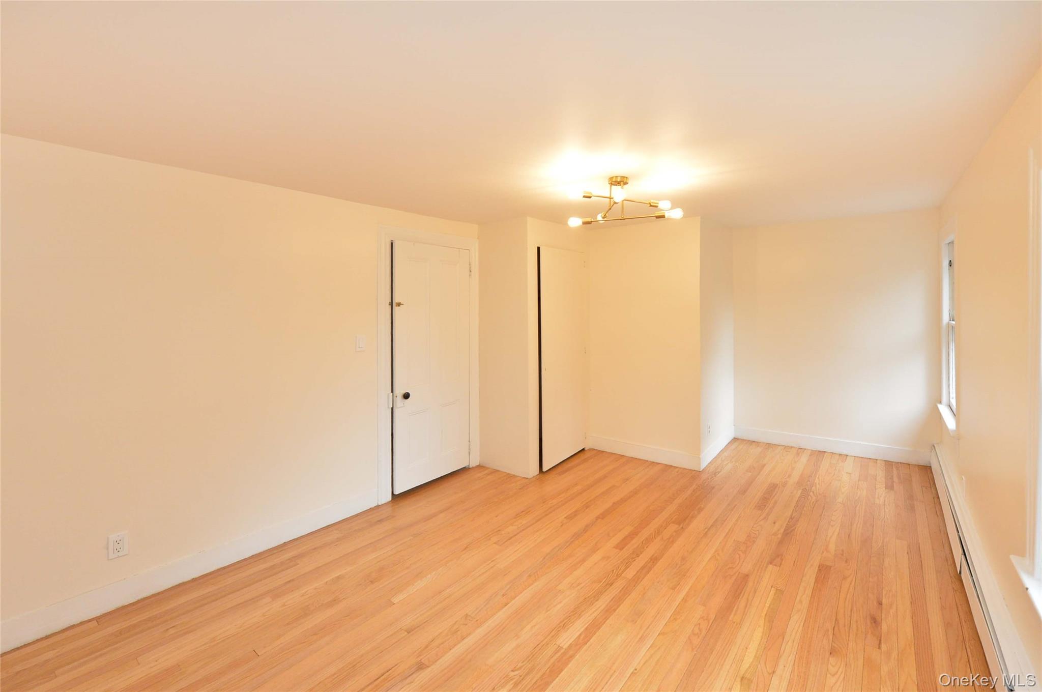 19 Johnsontown Road Sloatsburg, NY 10974 - Photo 32 of 41 a view of a room with wooden floor