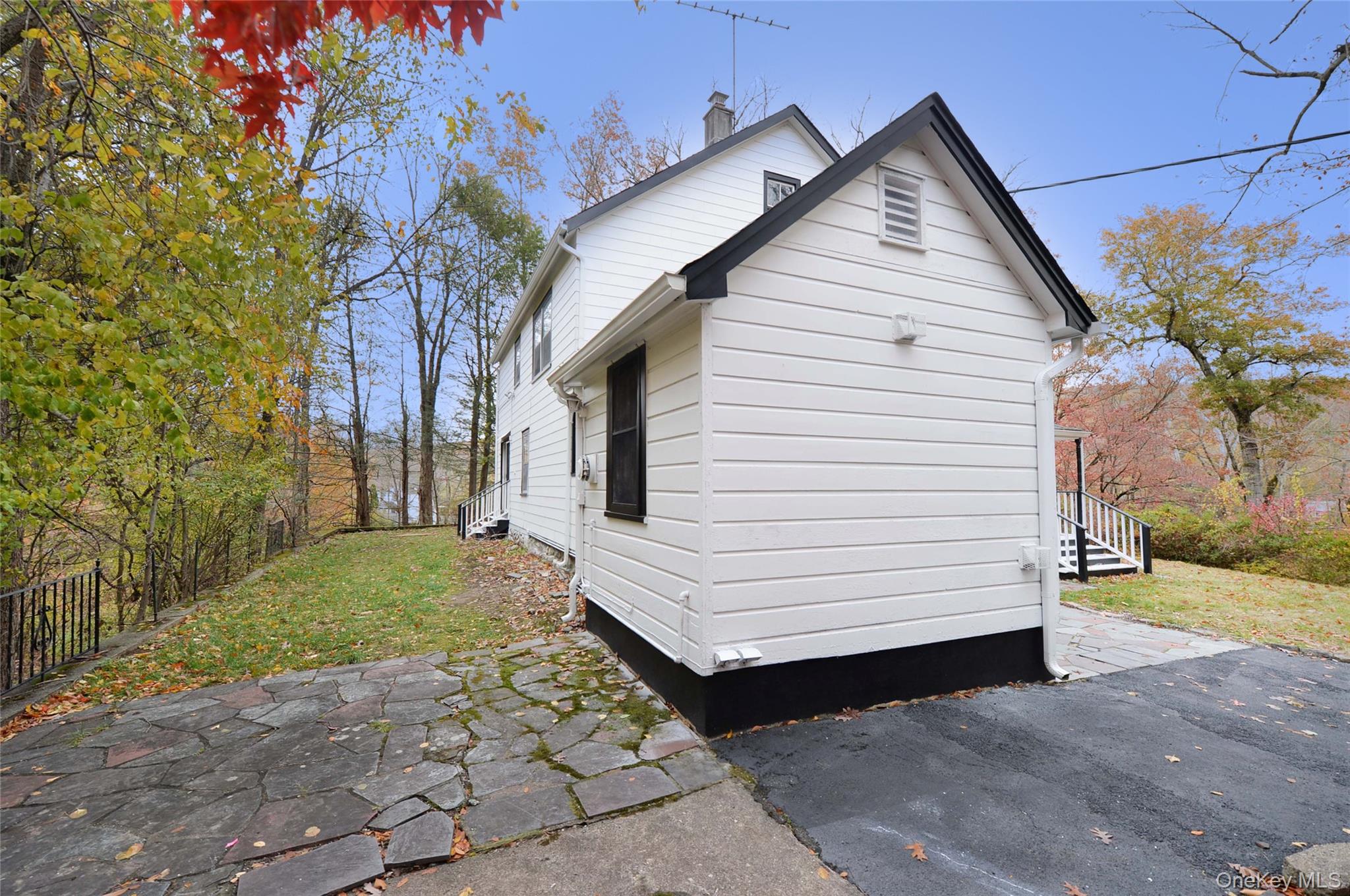 19 Johnsontown Road Sloatsburg, NY 10974 - Photo 36 of 41 a view of a small house with backyard
