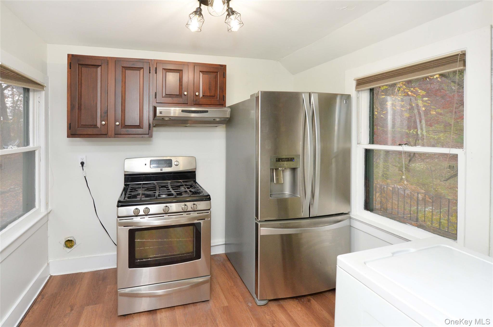 19 Johnsontown Road Sloatsburg, NY 10974 - Photo 7 of 41 a kitchen with a stove top oven and refrigerator