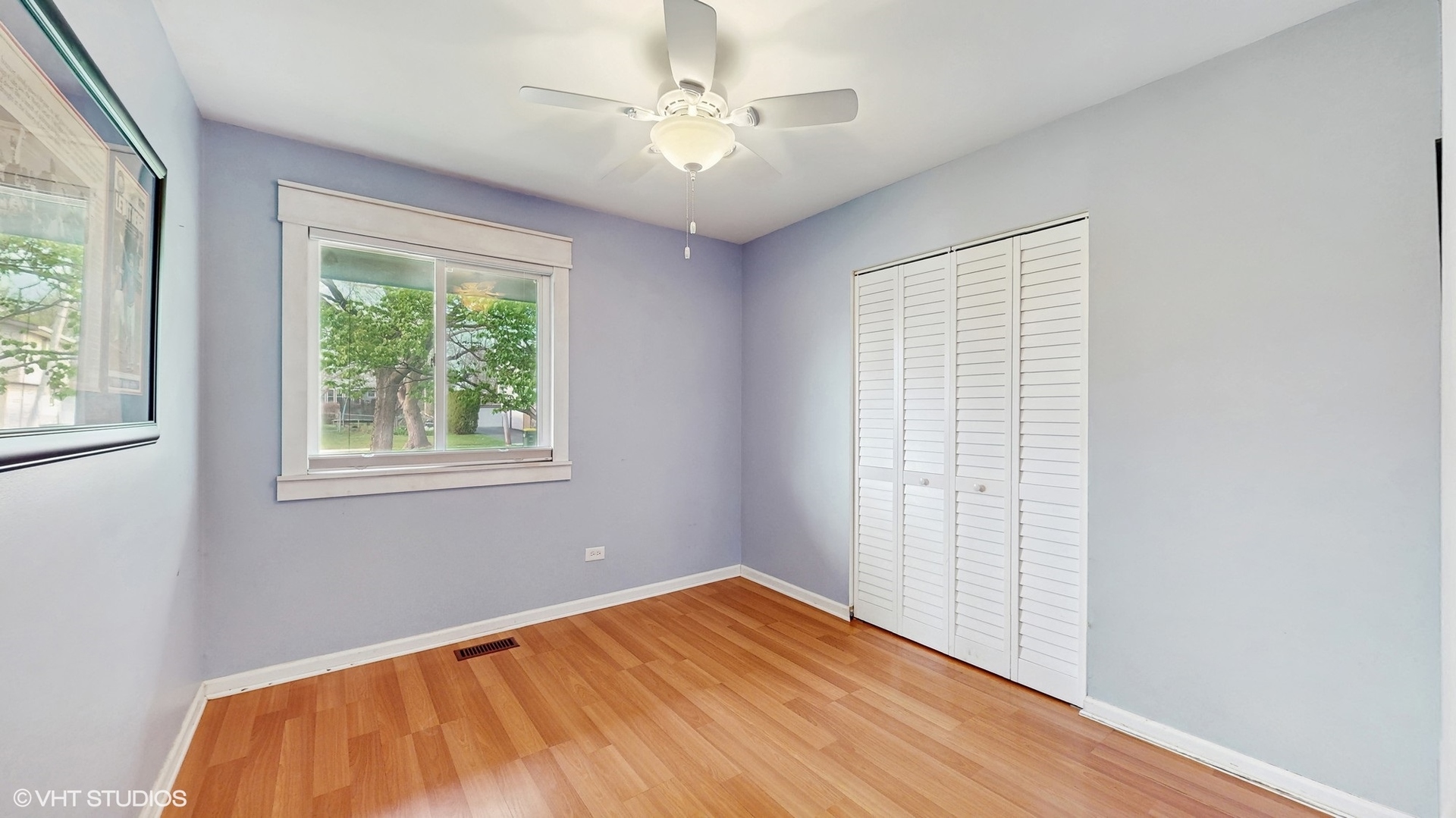 2206 Oak Lane Rolling Meadows, IL 60008 - Photo 15 of 24 a view of empty room with window and ceiling fan