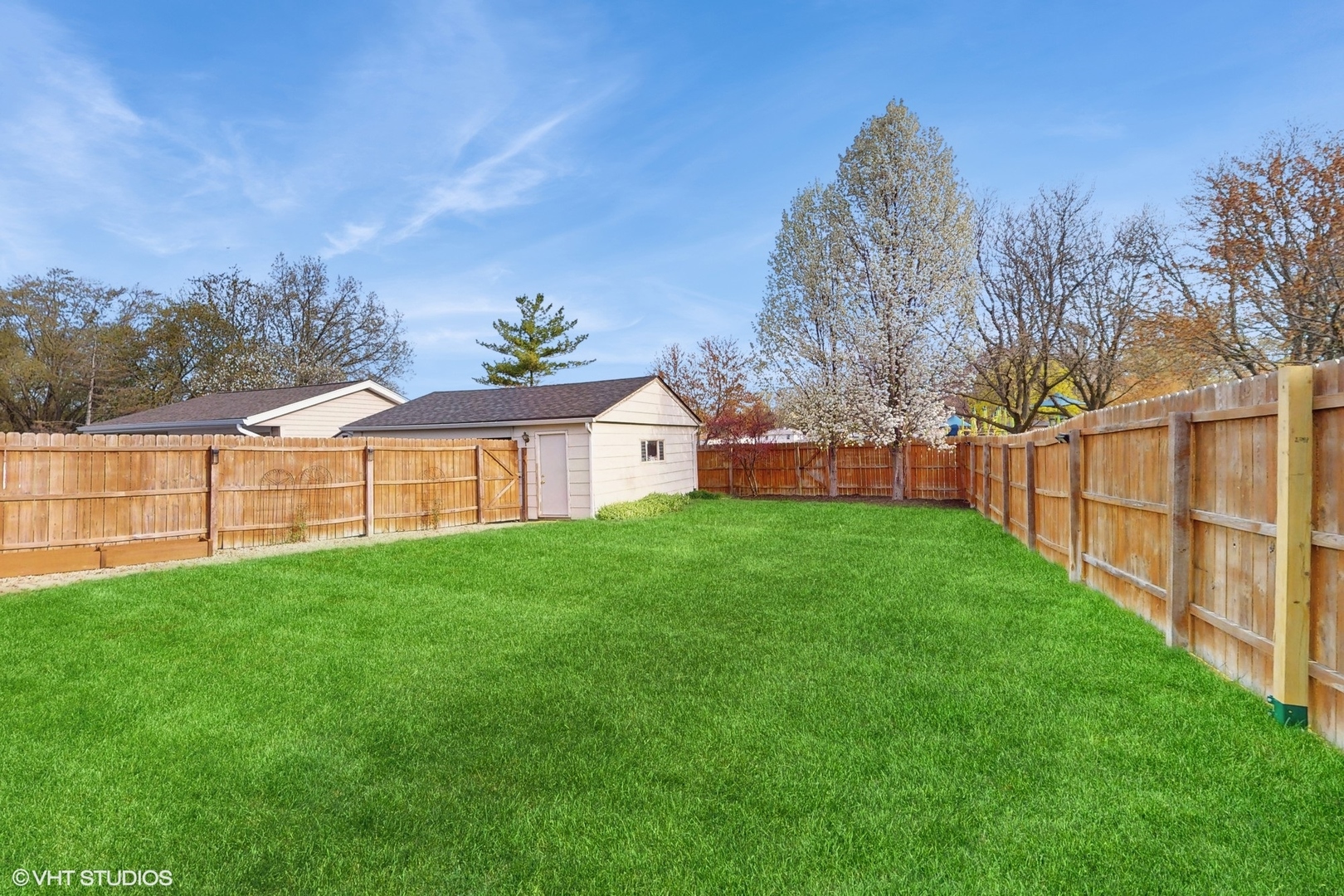 2206 Oak Lane Rolling Meadows, IL 60008 - Photo 22 of 24 a view of a house with backyard and garden