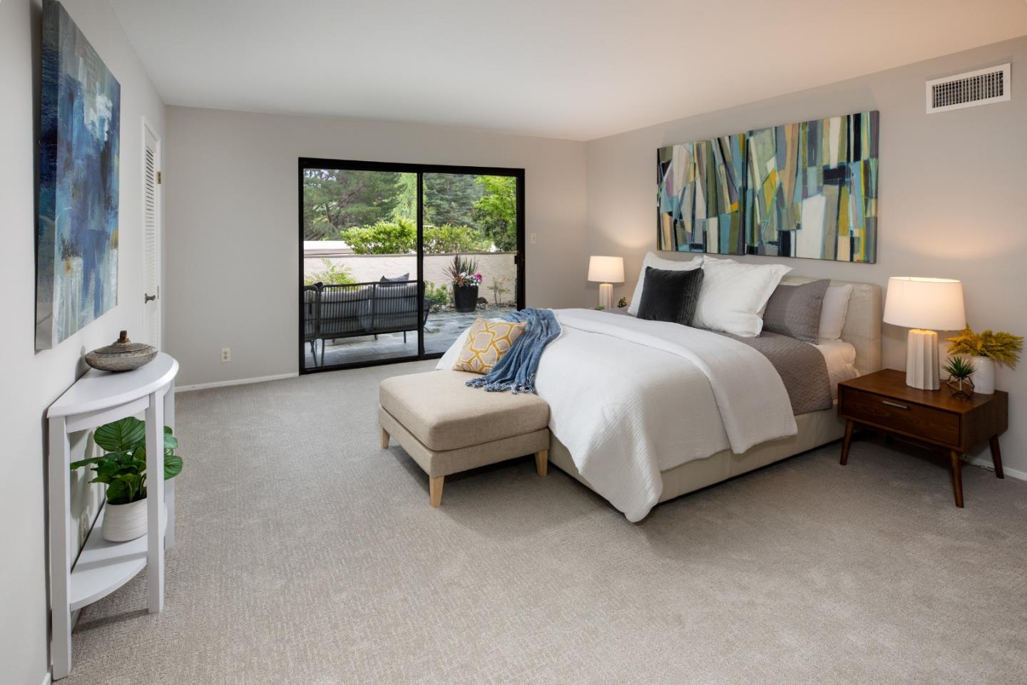 22415 Rancho Deep Cliff Drive Cupertino, CA 95014 - Photo 15 of 33 a spacious bedroom with a bed and a large window