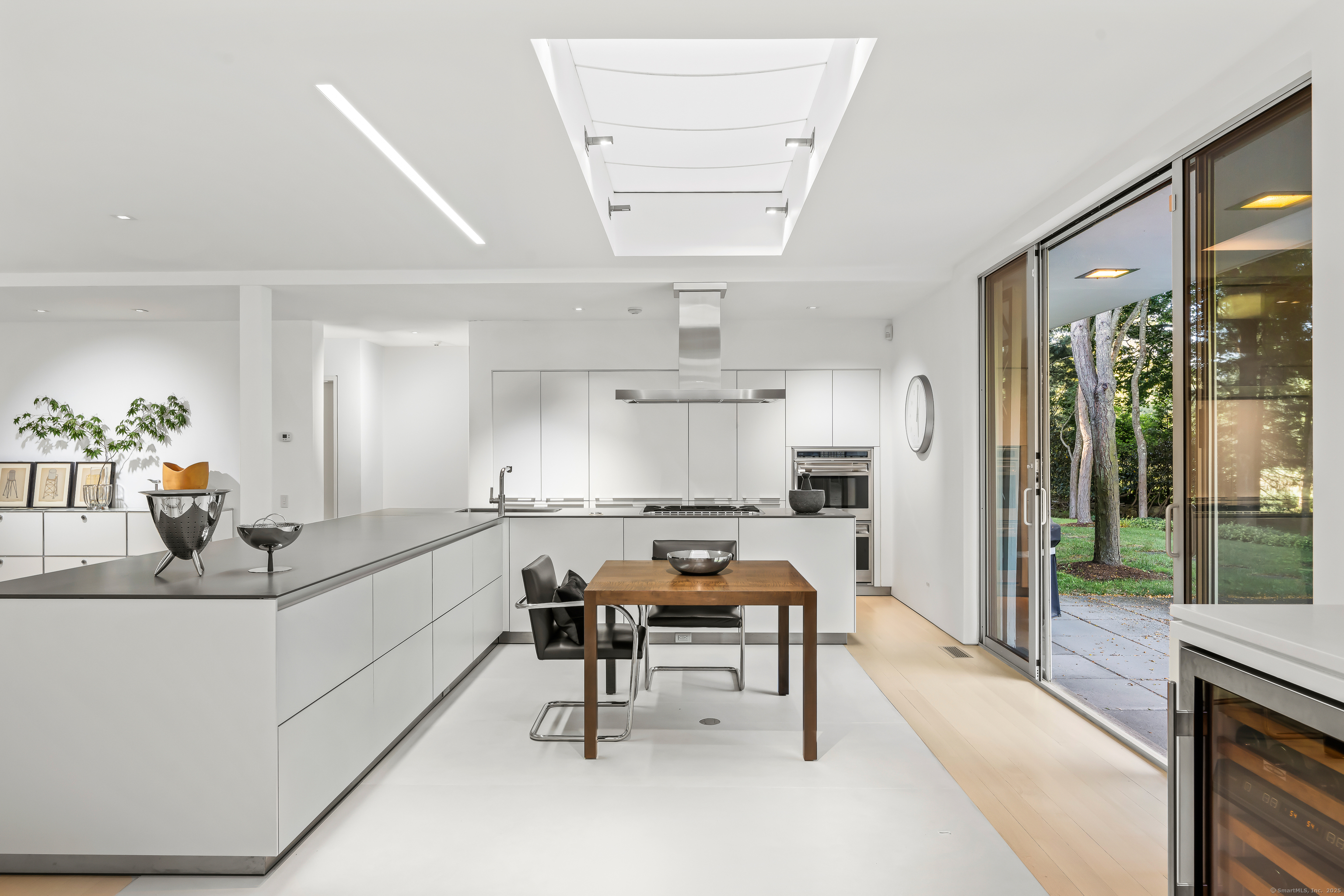 565 Oenoke Ridge New Canaan, CT 06840 - Photo 14 of 39 a living room with furniture and a table