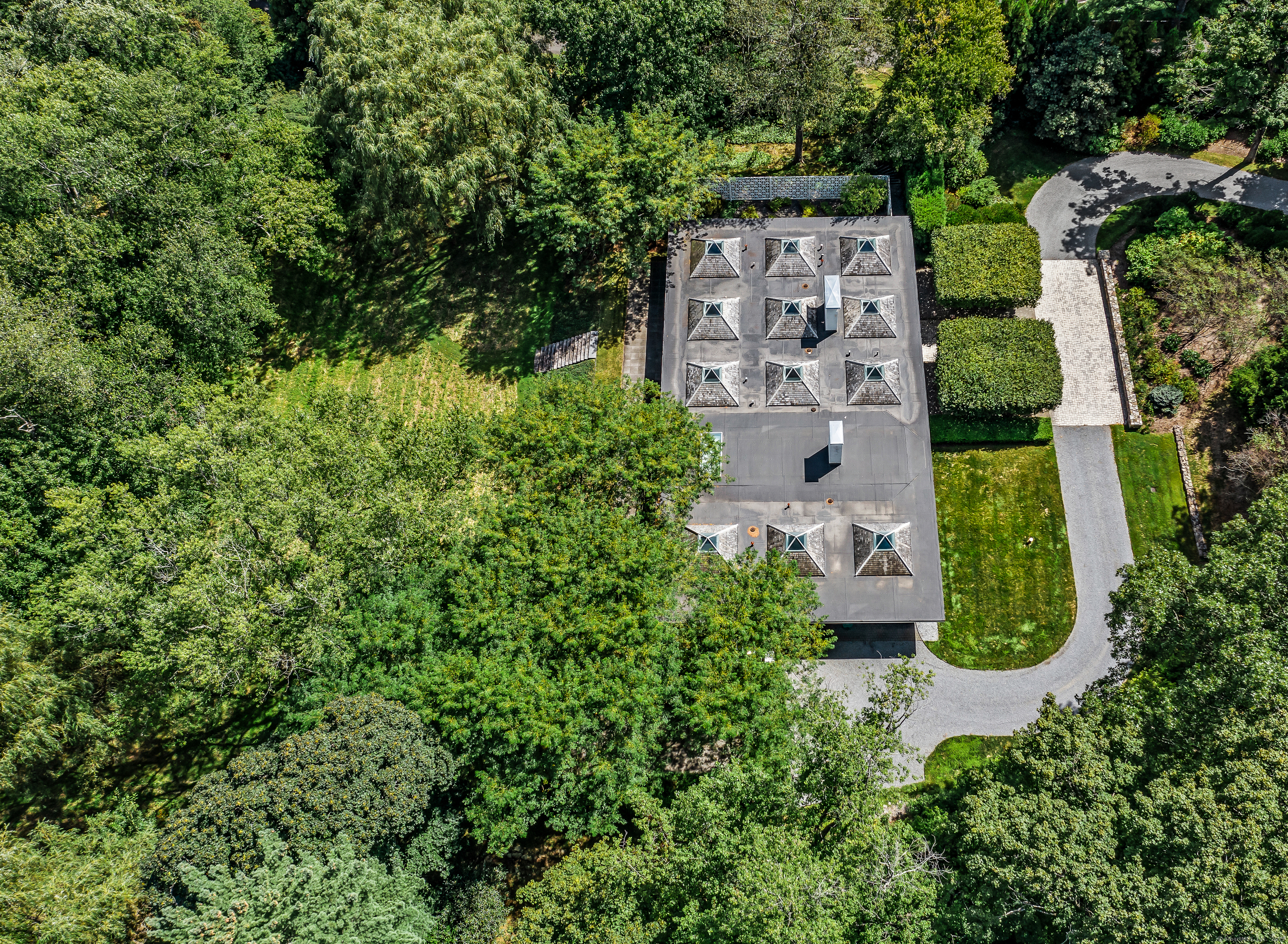 565 Oenoke Ridge New Canaan, CT 06840 - Photo 31 of 39 an aerial view of a house