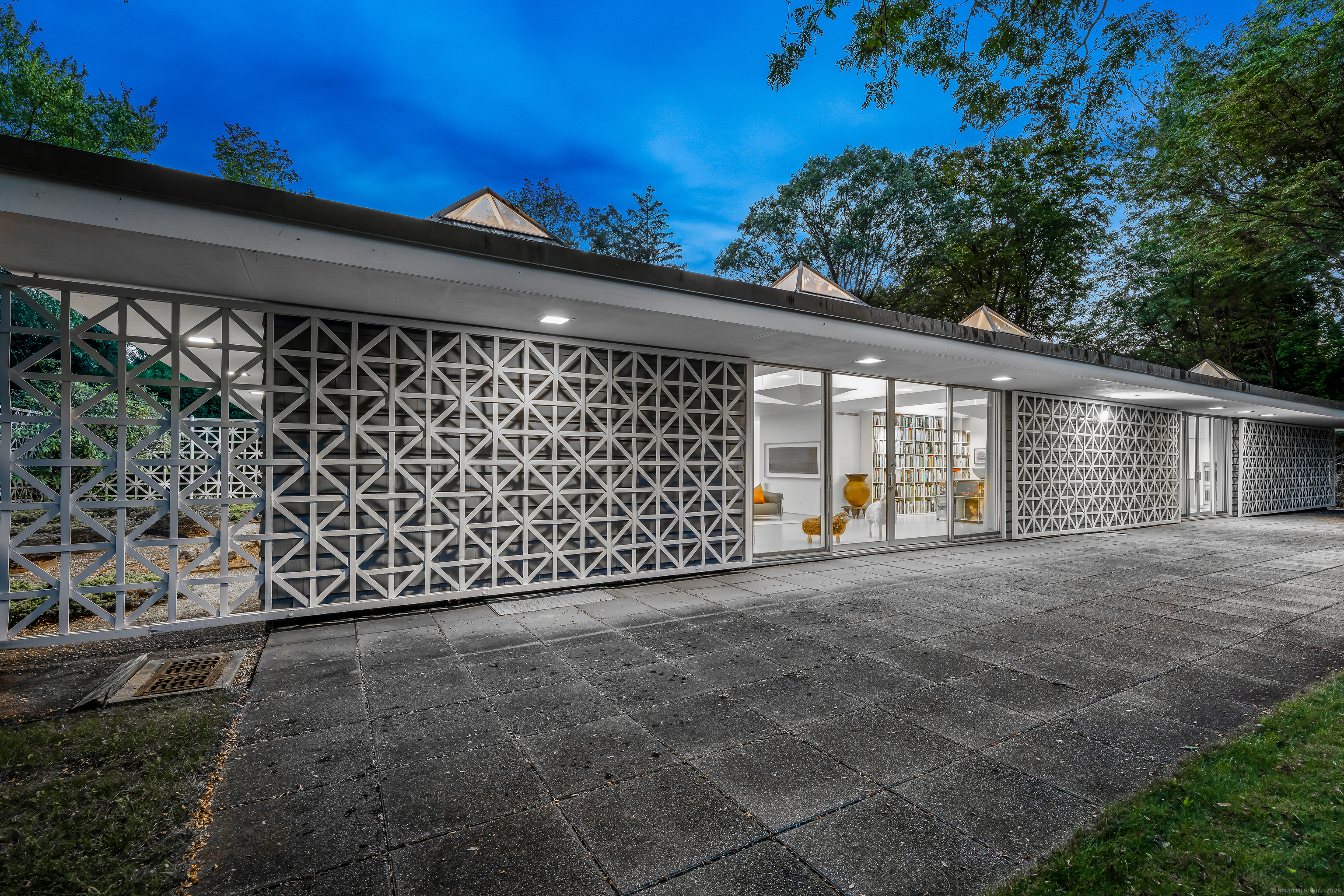 565 Oenoke Ridge New Canaan, CT 06840 - Photo 34 of 39 a view of a house with a outdoor space