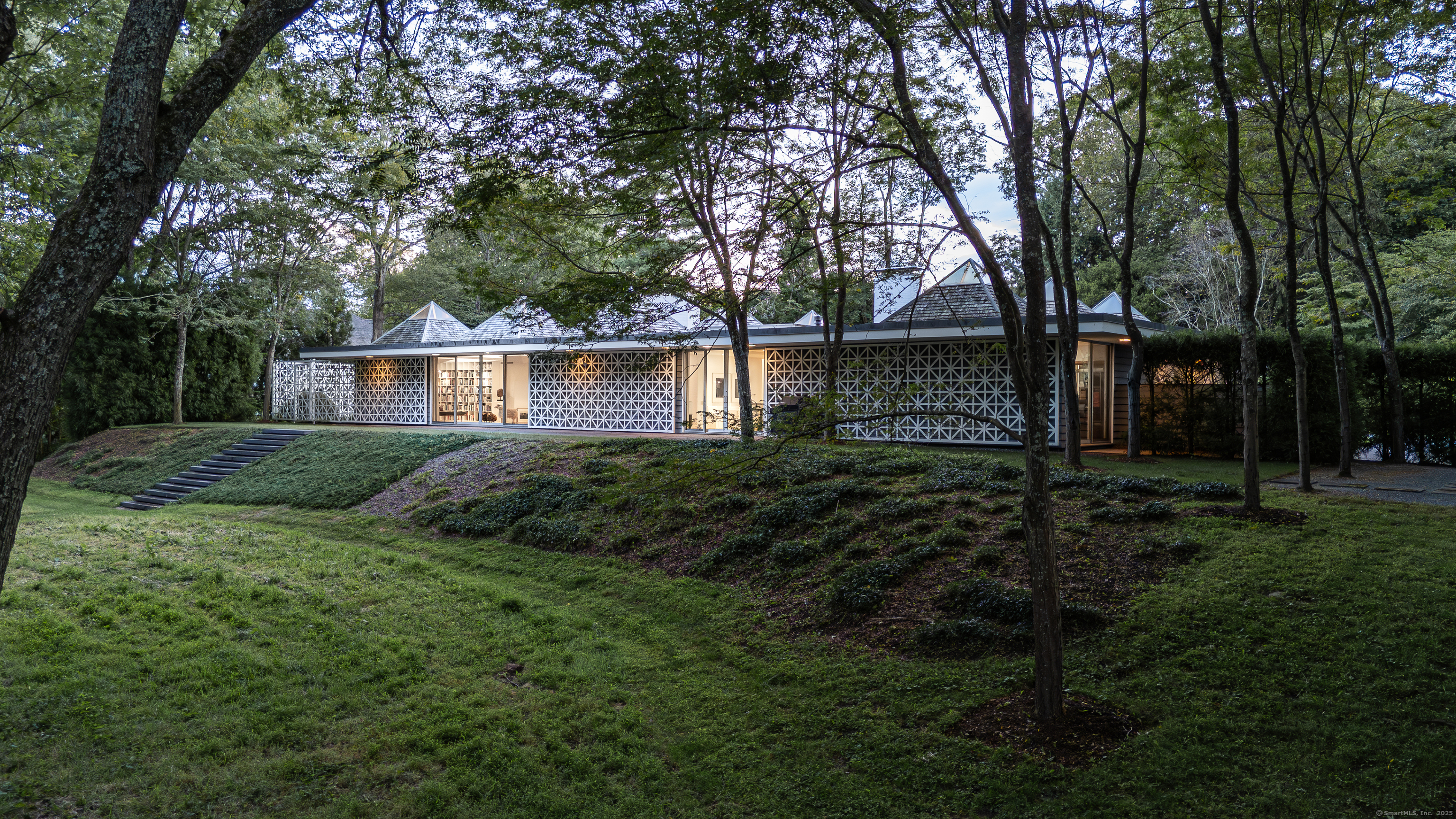 565 Oenoke Ridge New Canaan, CT 06840 - Photo 36 of 39 a view of backyard with green space