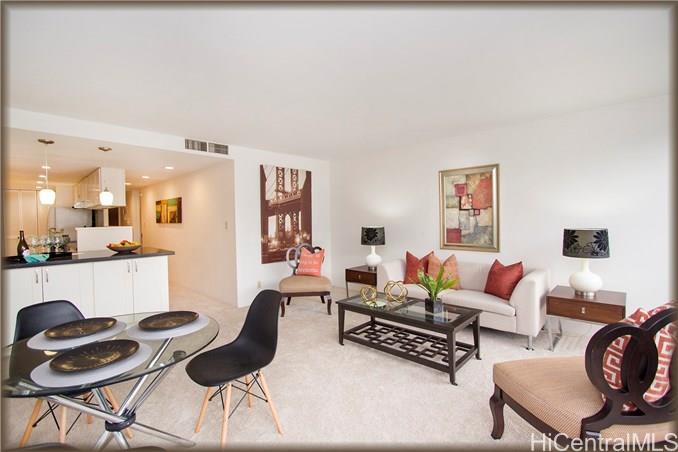217 Prospect Street, Unit A13 Honolulu, HI 96813 - Photo 1 of 1 a living room with furniture and a wooden floor