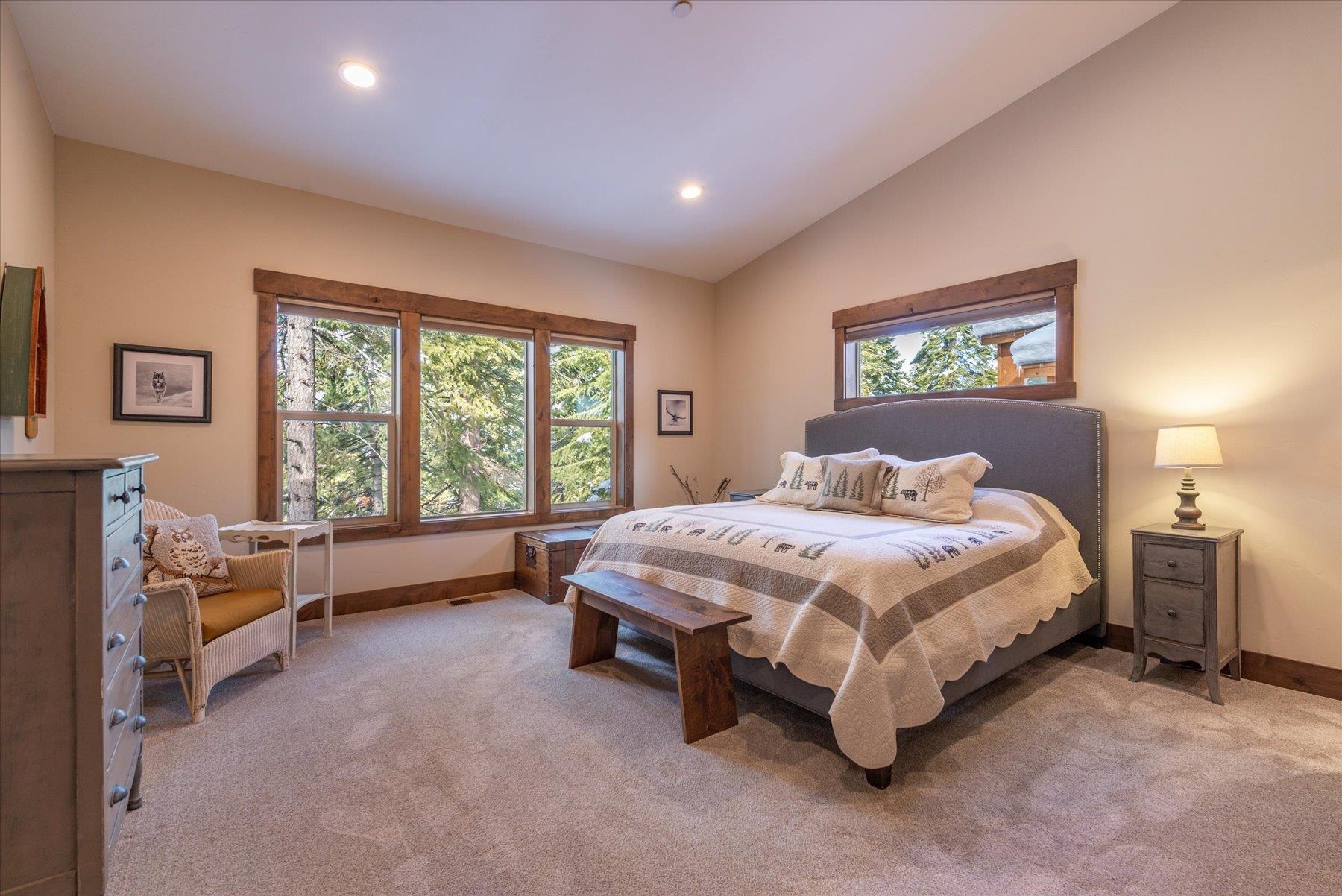 13846 Pathway Avenue Truckee, CA 96161 - Photo 13 of 28 a spacious bedroom with a bed and a large window
