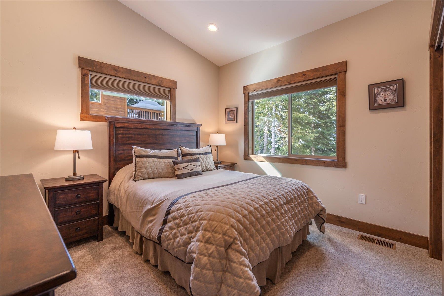 13846 Pathway Avenue Truckee, CA 96161 - Photo 18 of 28 a bedroom with a bed and a night stand