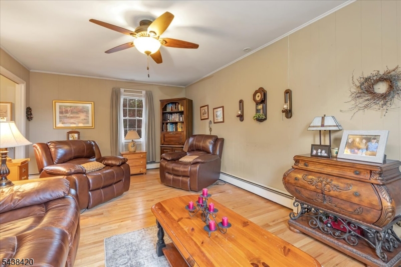 79 Main Street Califon, NJ 07830 - Photo 19 of 50 a living room with furniture and wooden floor
