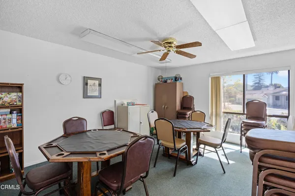 a workspace with furniture and a window
