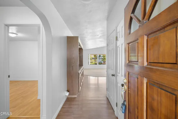 a view of hallway with livingroom