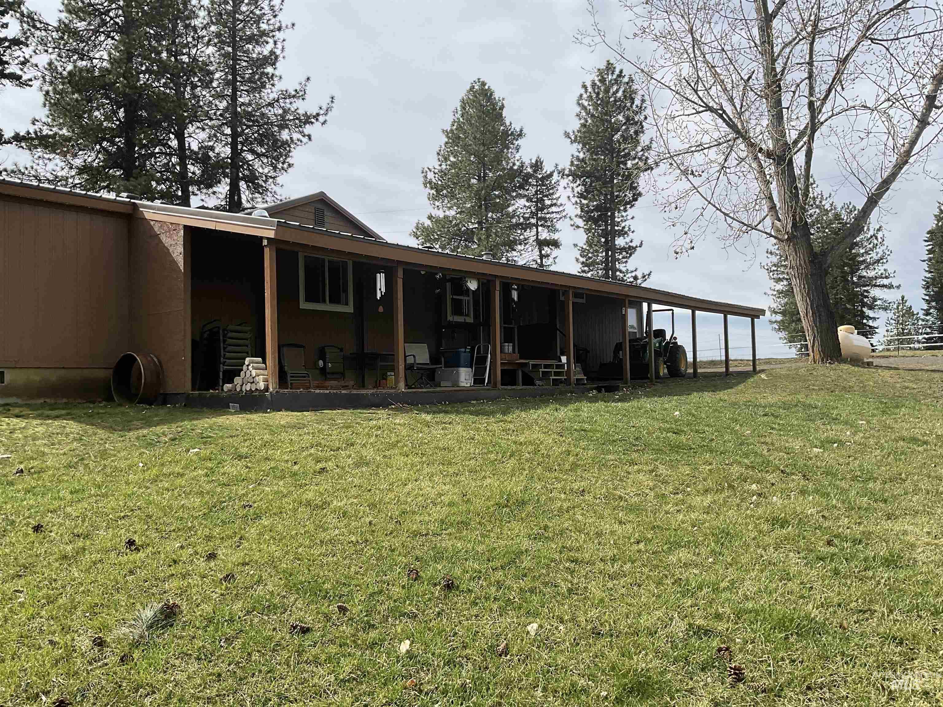 10749 Upper Fords Creek Road Orofino, ID 83544 - Photo 16 of 45 Back of property with a yard