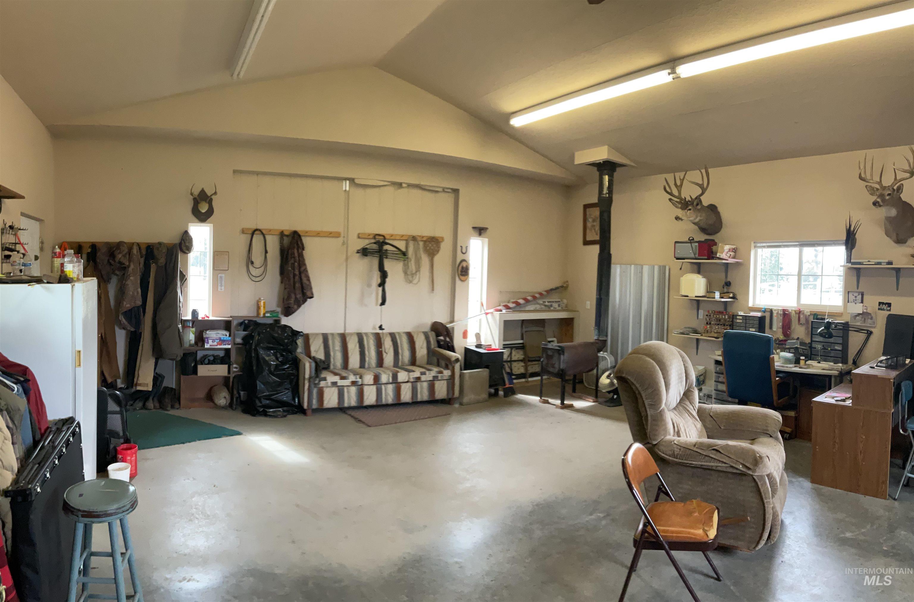 10749 Upper Fords Creek Road Orofino, ID 83544 - Photo 23 of 45 Garage featuring freestanding refrigerator