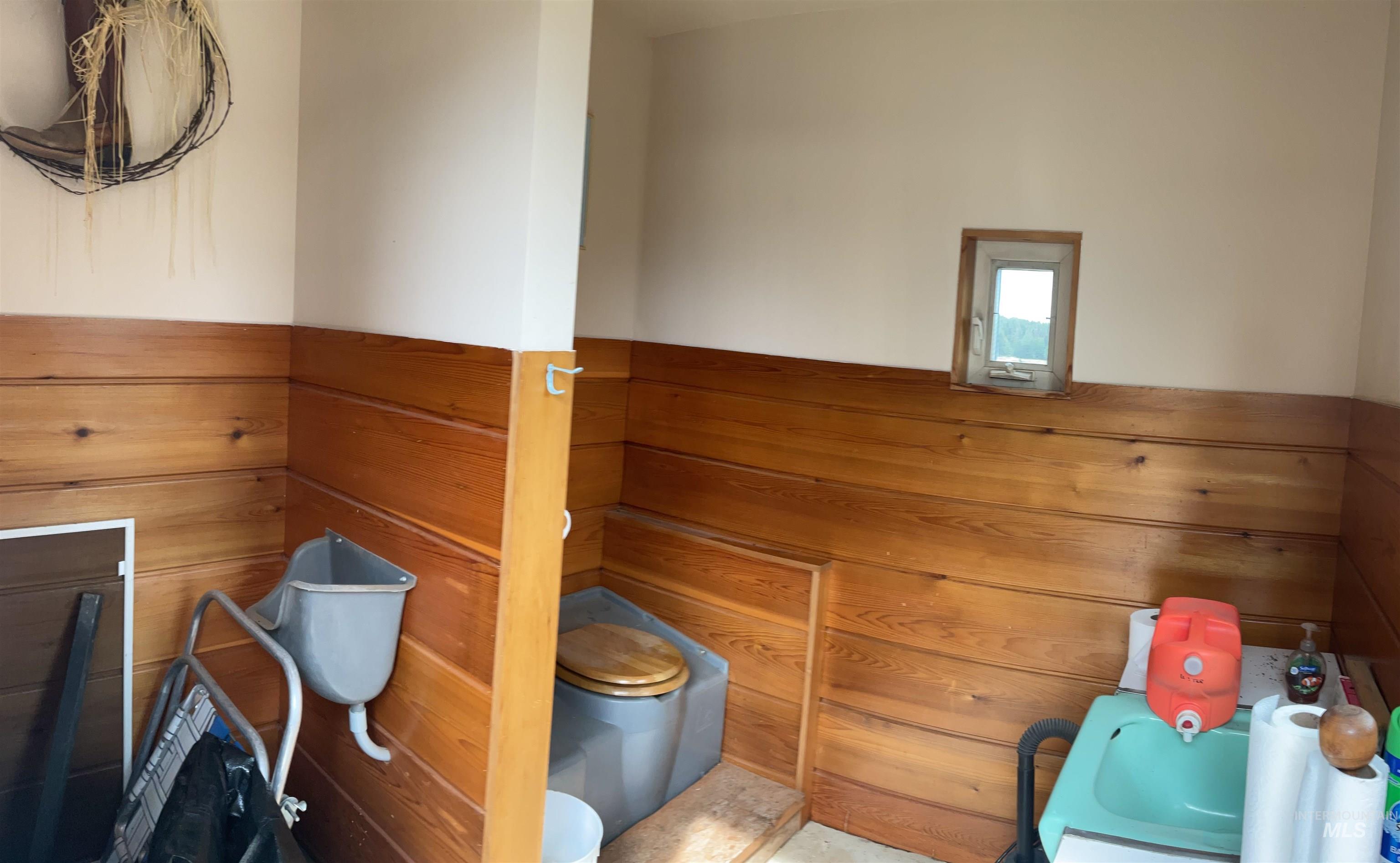 10749 Upper Fords Creek Road Orofino, ID 83544 - Photo 24 of 45 Relaxing sauna featuring wooden walls and a wainscoted wall