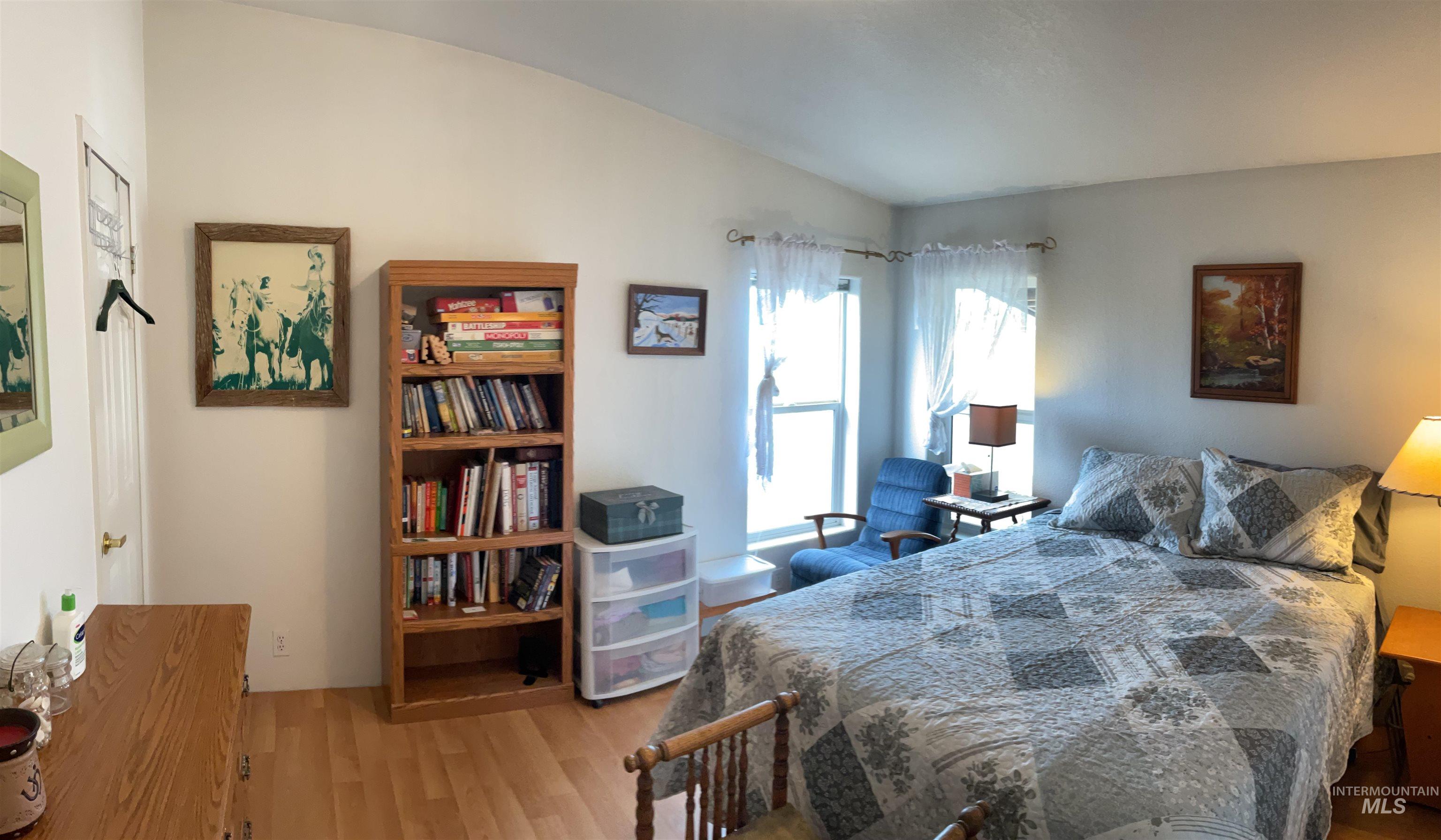 10749 Upper Fords Creek Road Orofino, ID 83544 - Photo 37 of 45 Bedroom featuring light wood-type flooring and lofted ceiling