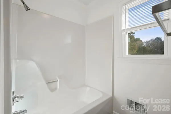 a bathroom with a bathtub