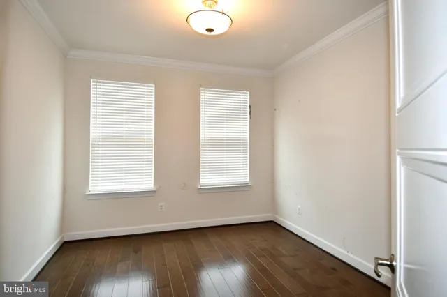 a bathroom with a sink vanity and toilet