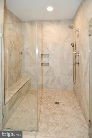 a view of hallway with wooden floor