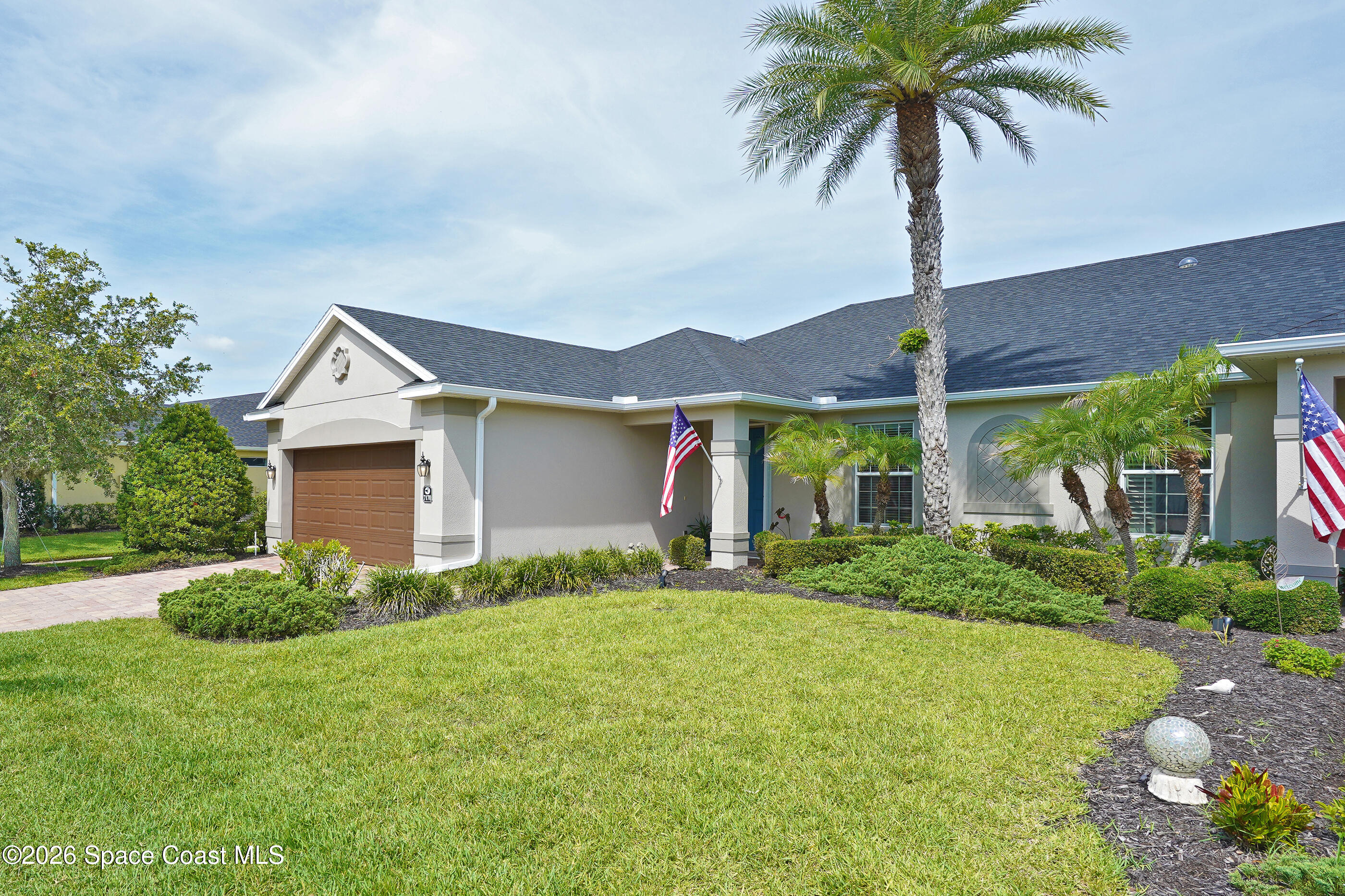 7170 Ralston Street Melbourne, FL 32940 - Photo 67 of 77 Front Yard Shared with Neighbor 1