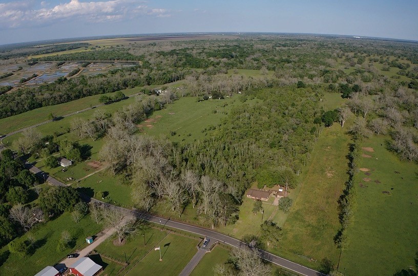 0 County Road 42 Rosharon, TX 77583 - Photo 14 of 14 an aerial view of a residential houses with outdoor space