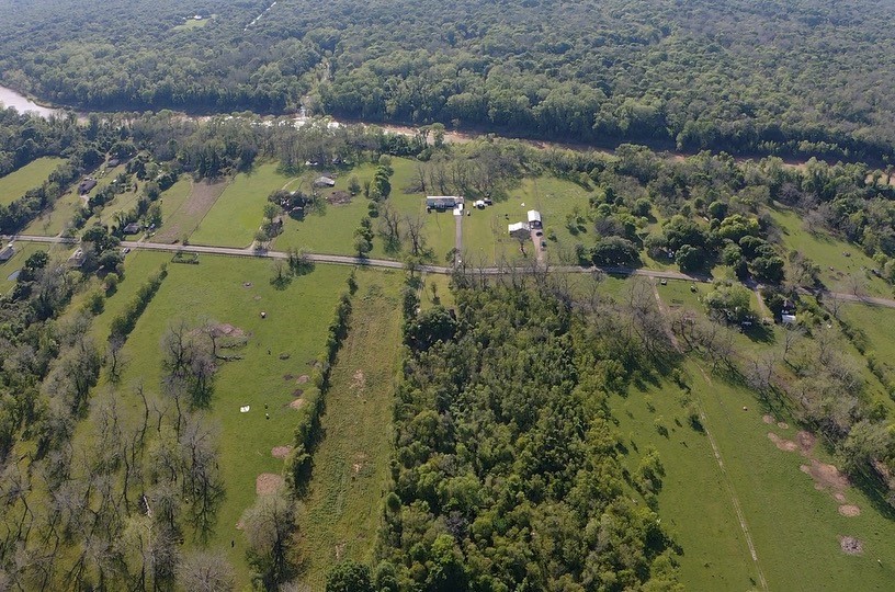 0 County Road 42 Rosharon, TX 77583 - Photo 3 of 14 an aerial view of residential houses with outdoor space and trees