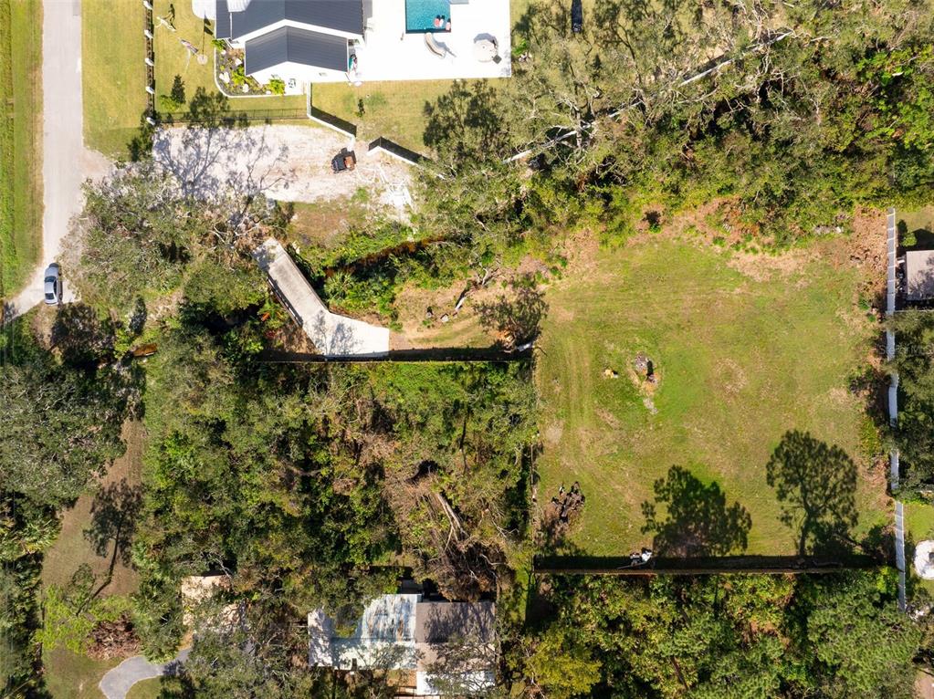 12295 95th Street North Largo, FL 33773 - Photo 14 of 23 a view of swimming pool from a lake
