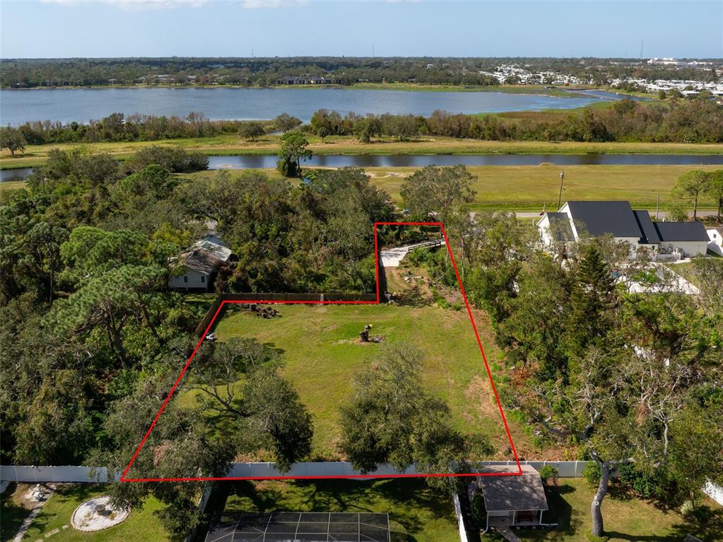 12295 95th Street North Largo, FL 33773 - Photo 17 of 23 a view of a lake with a city view