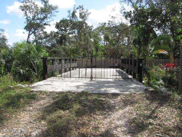 12295 95th Street North Largo, FL 33773 - Photo 19 of 23 a view of backyard with a trees