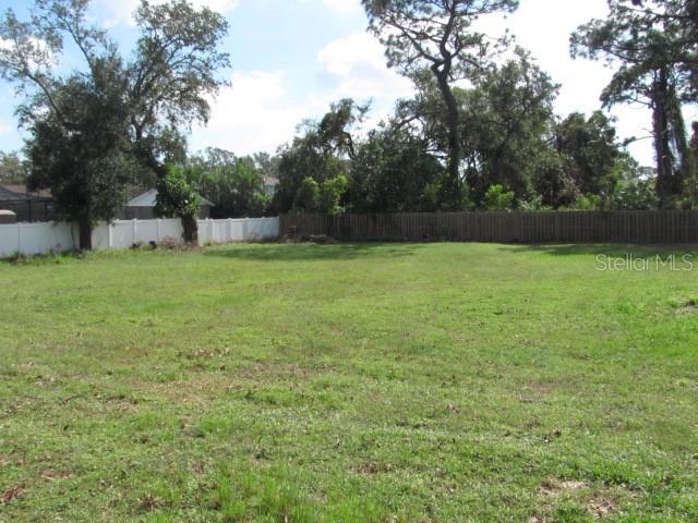 12295 95th Street North Largo, FL 33773 - Photo 21 of 23 a view of a field of grass and trees