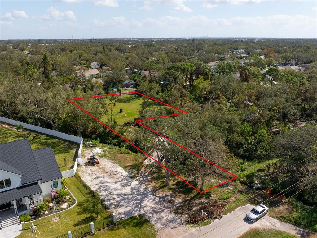 12295 95th Street North Largo, FL 33773 - Photo 4 of 23 an aerial view of residential houses with outdoor space