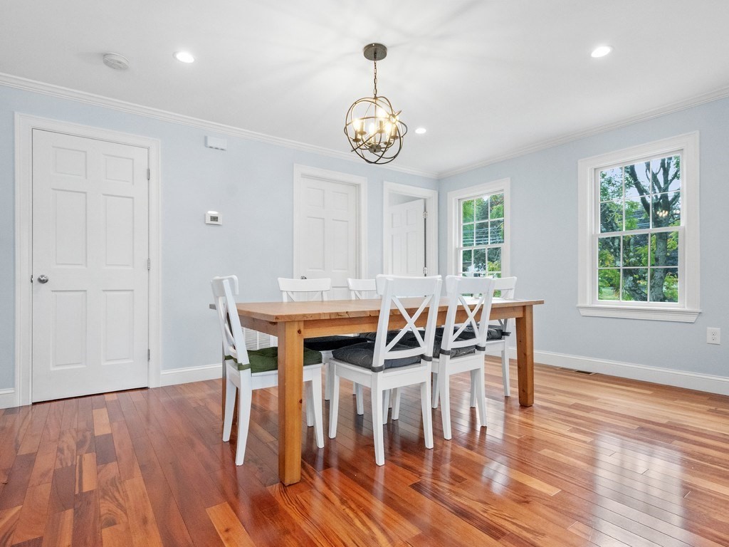 1767 Trapelo Road Waltham, MA 02451 - Photo 11 of 39 a view of a dining room with furniture window and wooden floor